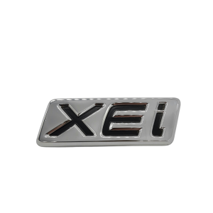 EMBLEMA "XEI" TOYOTA COROLLA VA EN BAUL ORIGINAL