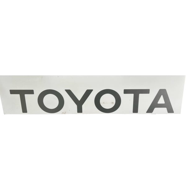 1_639185854093462137.jpg CALCOMANIA PALABRA "TOYOTA" GRIS HILUX 1992-2004 PORTON SPT - Imagen 1