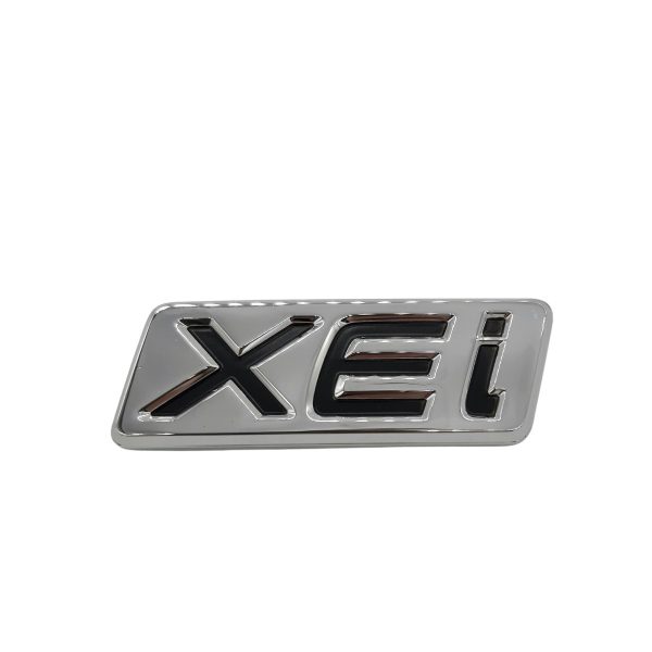 EMBLEMA "XEI" TOYOTA COROLLA VA EN BAUL ORIGINAL - Imagen 2