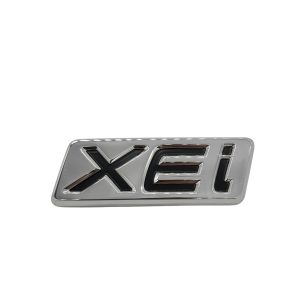 EMBLEMA "XEI" TOYOTA COROLLA VA EN BAUL ORIGINAL