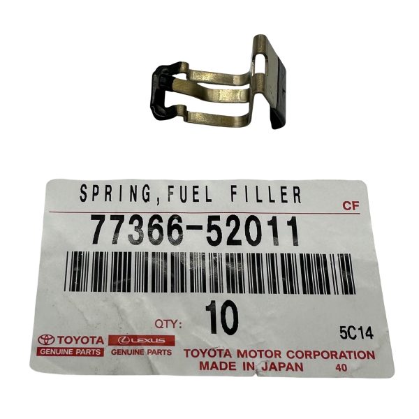 1_639271344697177609.jpg RESORTE DE TAPA DE TANQUE YARIS 2017-2026 ORIGINAL - Imagen 1
